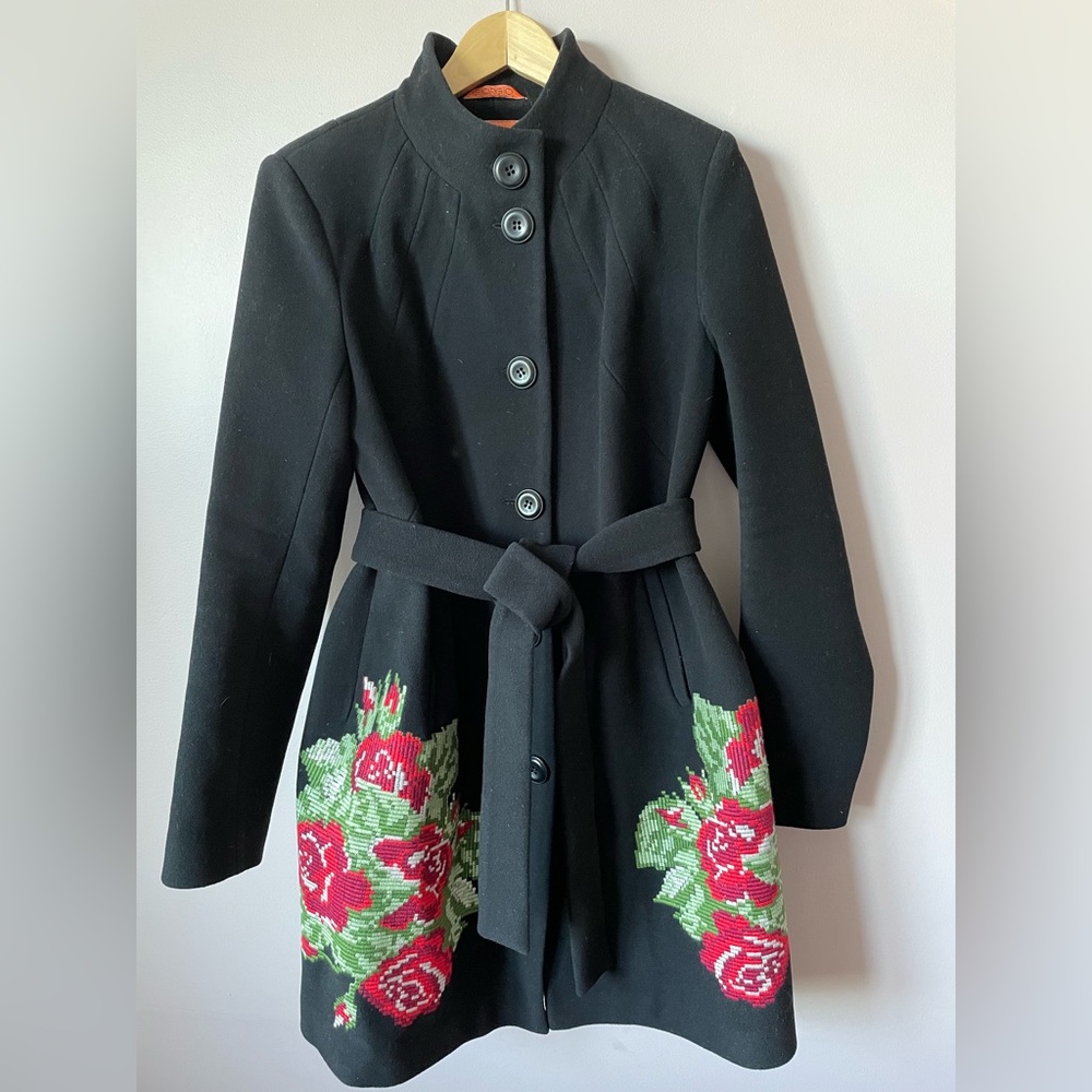 Black coat with embroidered flowers